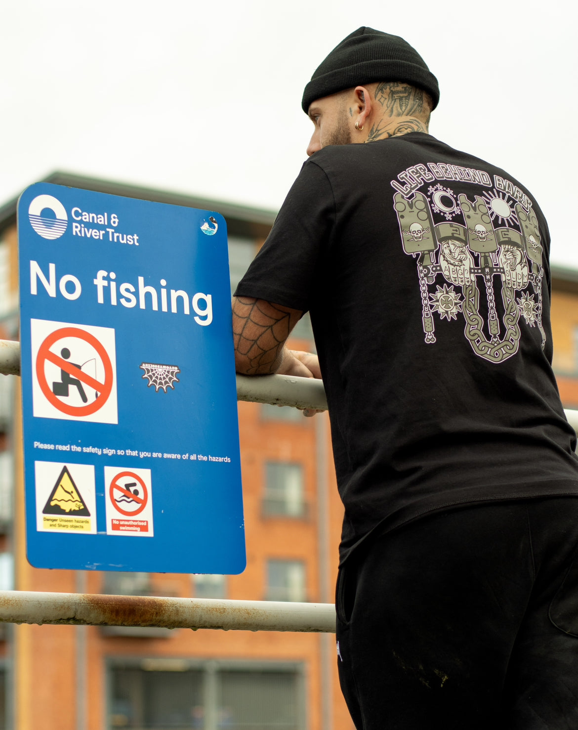 “LIFE BEHIND BARS” tee.